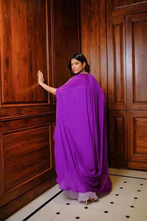 Purple cape jacket with crop top and draped shaded skirt