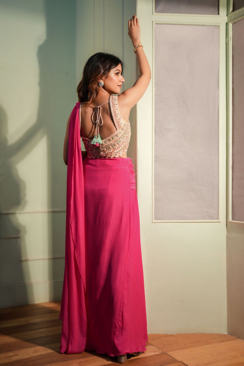 Fuchsia pink draped saree with blouse