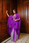 Purple cape jacket with crop top and draped shaded skirt