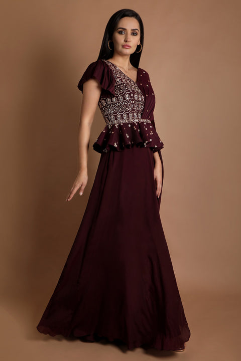 Plum peplum style one side draped gown.