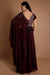 Plum peplum style one side draped gown.