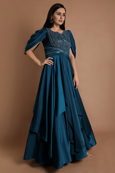 Teal blue layered draped sleeves gown.