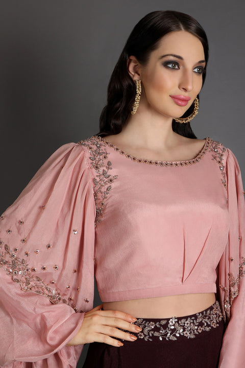 Wine poncho top with layered skirt.