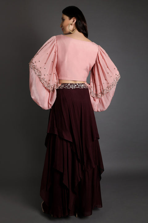 Wine poncho top with layered skirt.