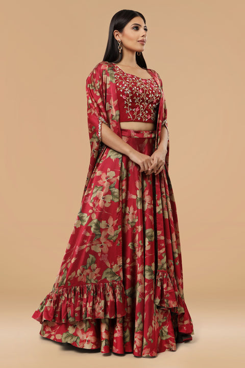 Maroon floral print skirt with crop top and cape set.