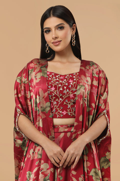 Maroon floral print skirt with crop top and cape set.