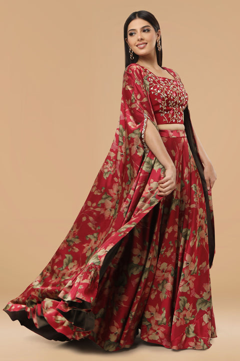 Maroon floral print skirt with crop top and cape set.