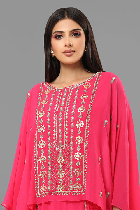 Hot pink flow top with flared gathered skirt set.