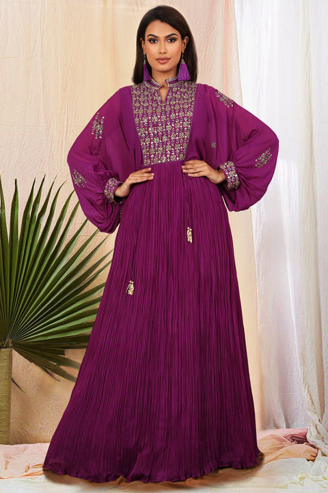 Purple crepe crush Gown with poncho sleeves.