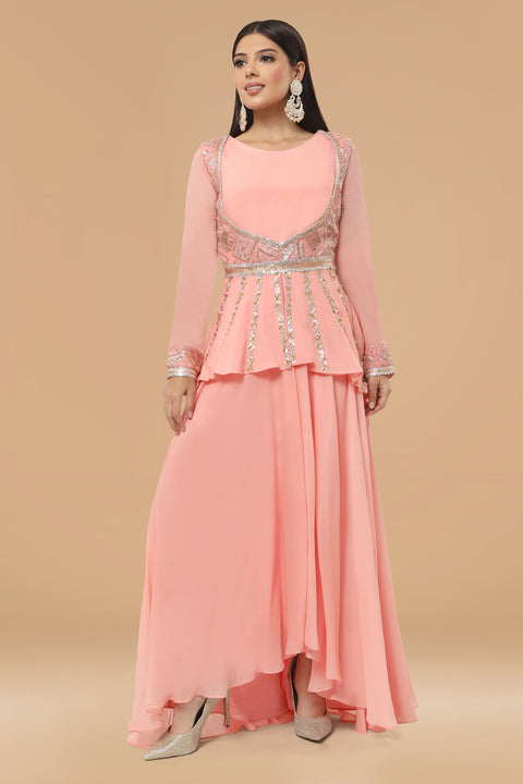 Baby pink peplum gown in crepe fabric.