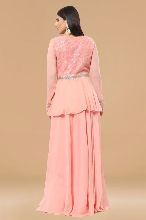 Baby pink peplum gown in crepe fabric.
