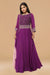 Purple gown in textured and crepe fabric.