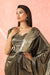 Gold metallic shimmer draped saree gown.