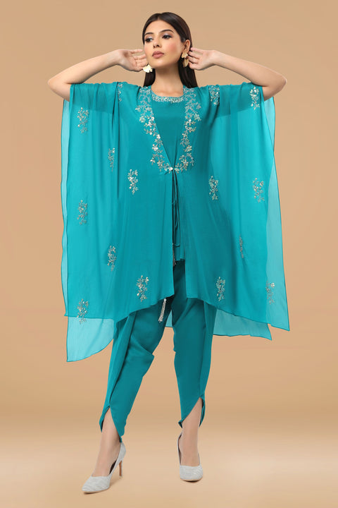 Turquoise blue tunic with handkerchief jacket and dhoti pants.