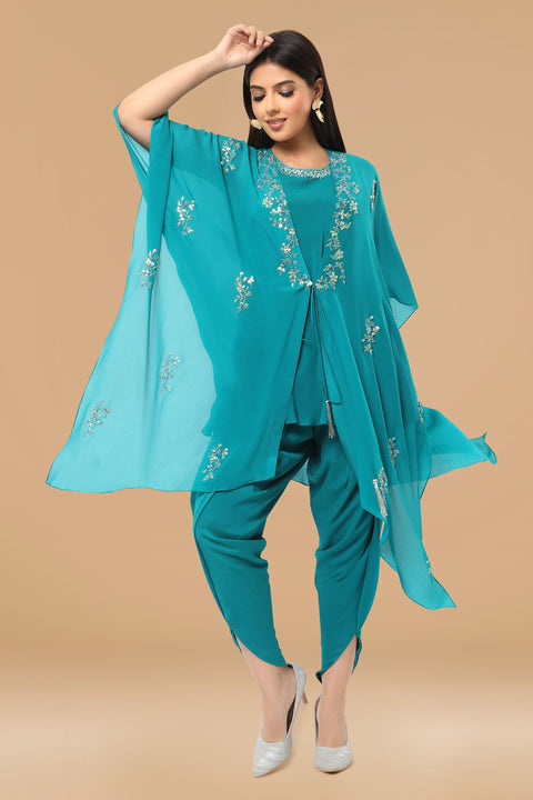Turquoise blue tunic with handkerchief jacket and dhoti pants.