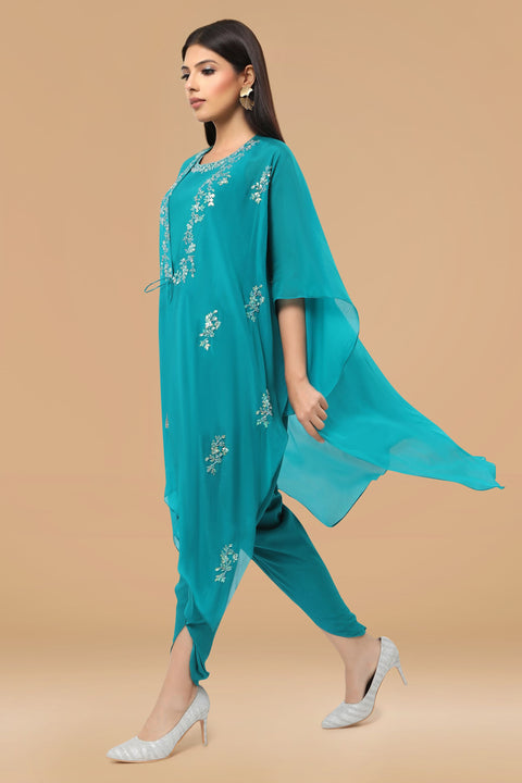 Turquoise blue tunic with handkerchief jacket and dhoti pants.
