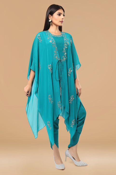 Turquoise blue tunic with handkerchief jacket and dhoti pants.