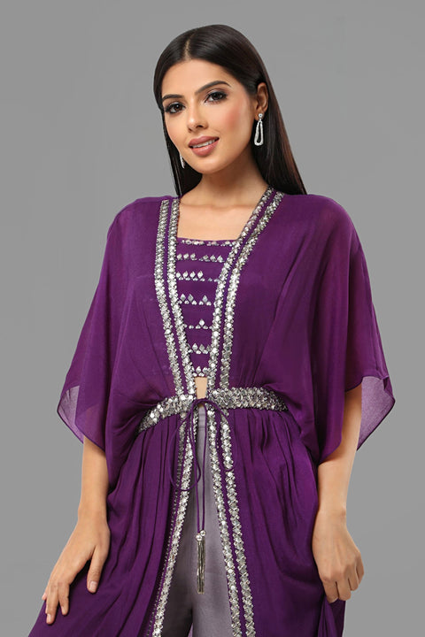Purple crepe crop top with jacket and flared pallazo.