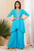 Turquoise blue high low tunic with pallazo.