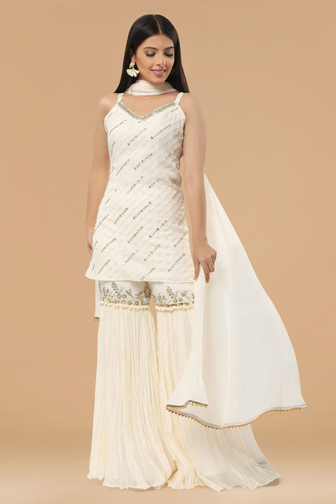 Ivory textured fabric kurta with gharara and dupatta.