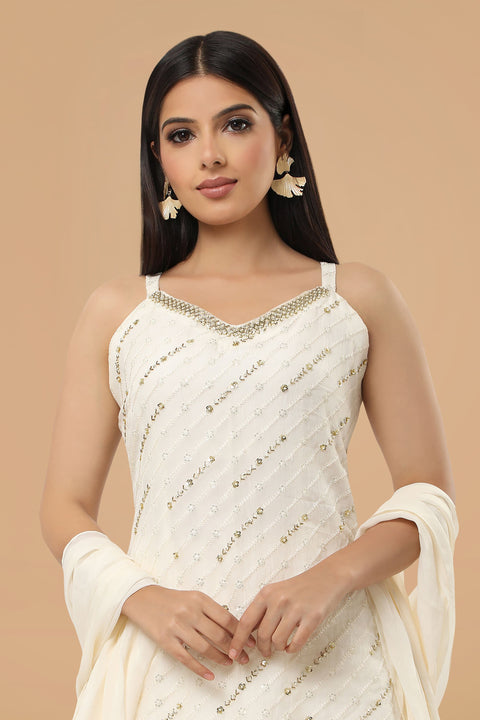 Ivory textured fabric kurta with gharara and dupatta.