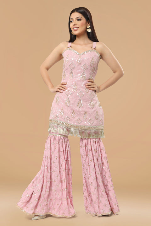Onion pink textured fabric kurta with gharara and dupatta.