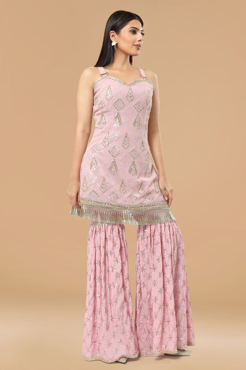 Onion pink textured fabric kurta with gharara and dupatta.