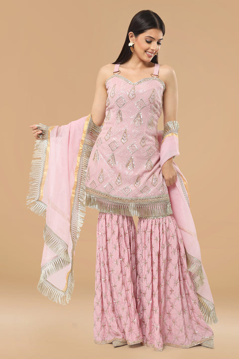 Onion pink textured fabric kurta with gharara and dupatta.