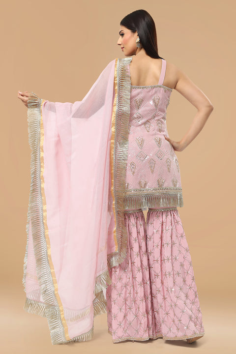 Onion pink textured fabric kurta with gharara and dupatta.