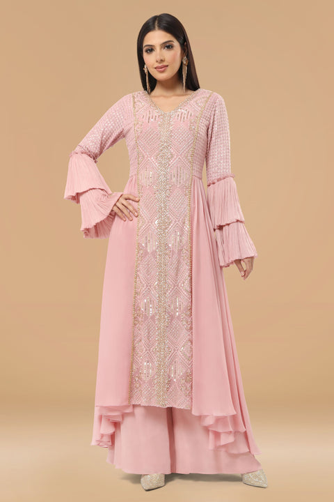 Mauve pink textured fabric and crepe flared and drape A line kurta with pallazo set.