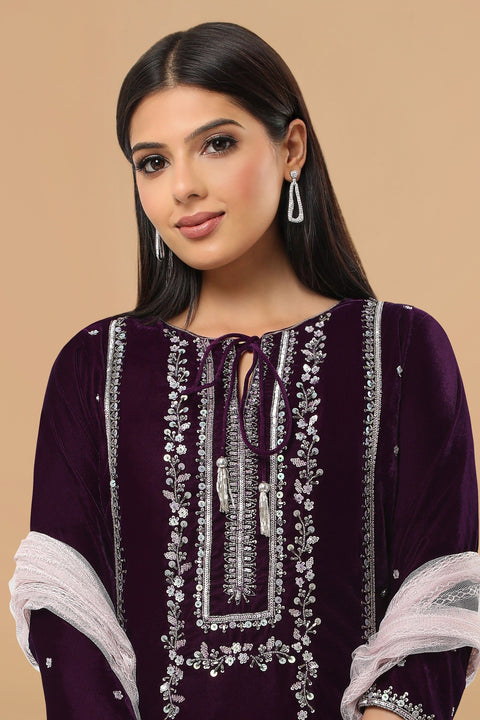 Purple A line velvet kurta with matching pallazo and contrast dupatta.