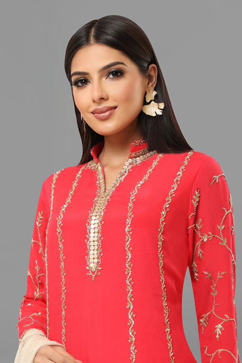 Tomato red a line kurta, over lap pants in crepe and dupatta.