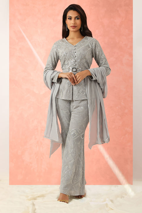 Grey textured fabric highlighted peplum top, flared pants and dupatta.