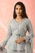 Grey textured fabric highlighted peplum top, flared pants and dupatta.