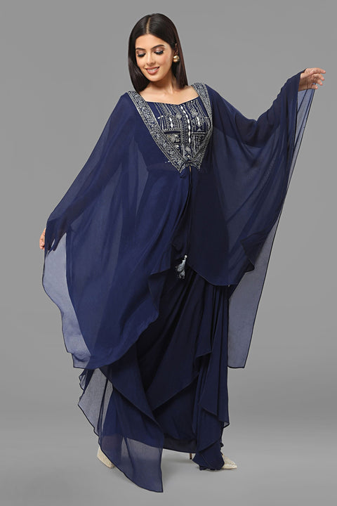 Navy blue draped skirt with matching crop top and jacket set in crepe fabric.