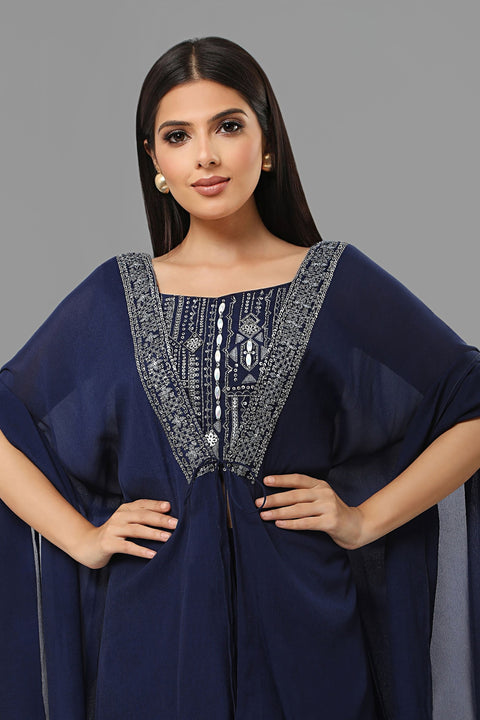 Navy blue draped skirt with matching crop top and jacket set in crepe fabric.