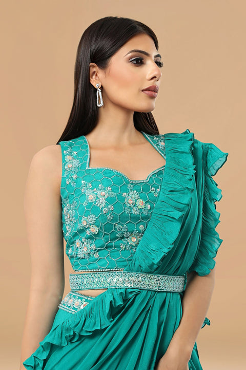 Bright blue crop top, skirt, ruffled dupatta and belt set.