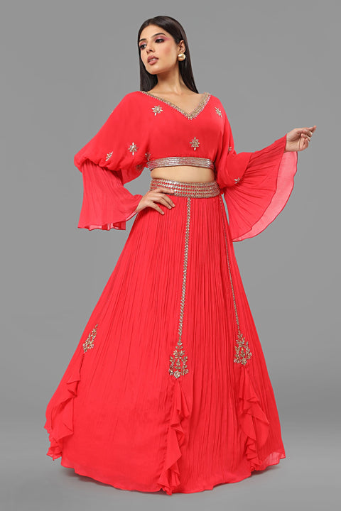 Red designer sleeves crop top with gathered skirt in crepe fabric.