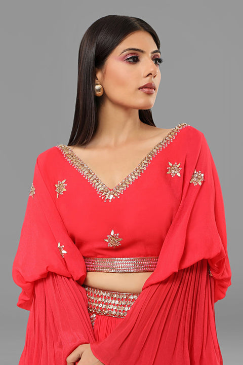 Red designer sleeves crop top with gathered skirt in crepe fabric.