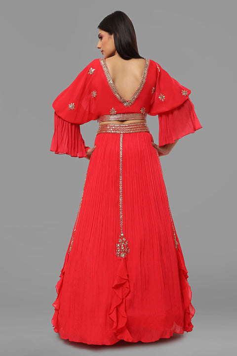 Red designer sleeves crop top with gathered skirt in crepe fabric.