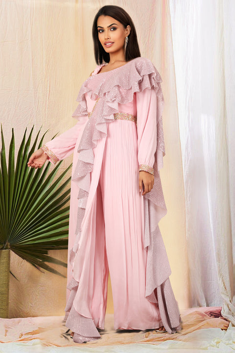 Baby pink crepe saree style jumpsuit with ruffles.