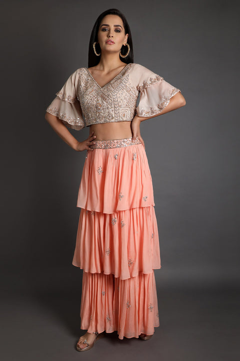 Peach layered gharara with crop top.