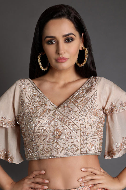 Peach layered gharara with crop top.