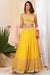 Mustard yellow flared skirt with matching crop top and contrast babypink dupatta.