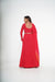 Red gown with shaded drape.