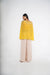 Mustard cape crop top with asymmetric drape and palazzo set.