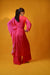 Hot pink fit and flare tunic with one side flared cuffs sleeves with palazzo set.