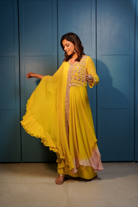 Bright yellow fit and flared asymmetric shaded tunic with one side drape and palazzo set.