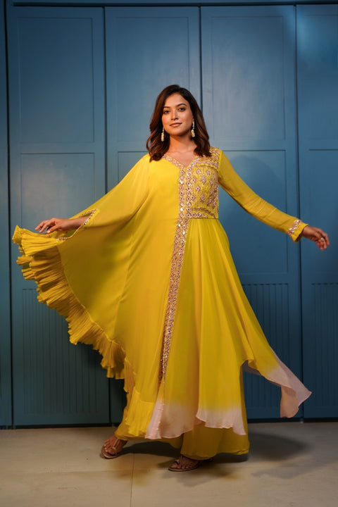 Bright yellow fit and flared asymmetric shaded tunic with one side drape and palazzo set.