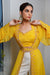 Mustard crepe jacket with crop top and Ivory pallazo.